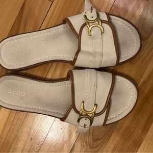 Aldo Cream and Tan Buckle Mules